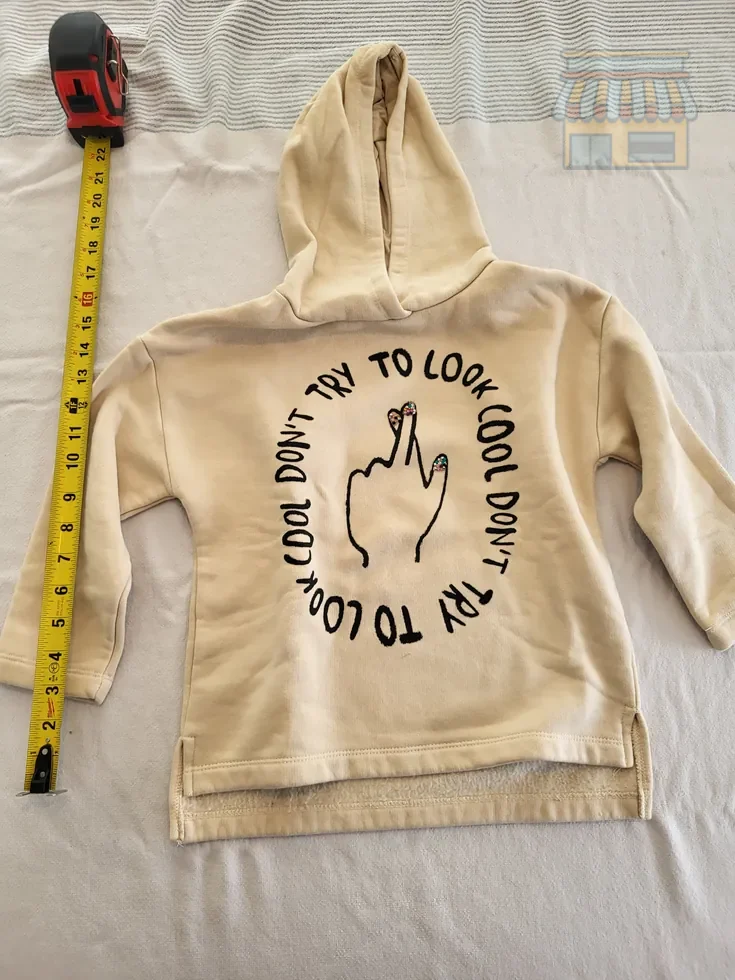 Girls' Beige Hooded Graphic Hoodie • Condition: Excellent • Location: Davie, FL • Price: Free