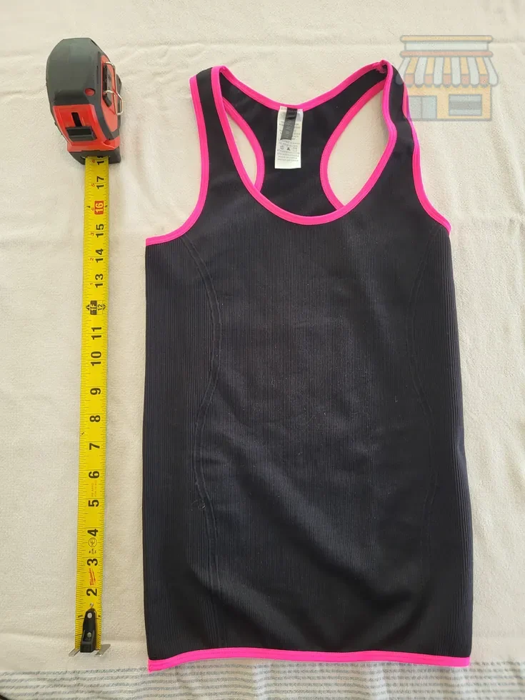 Girls' Black Racerback Tank Top with Pink Trim • Condition: Excellent • Location: Davie, FL • Price: Free