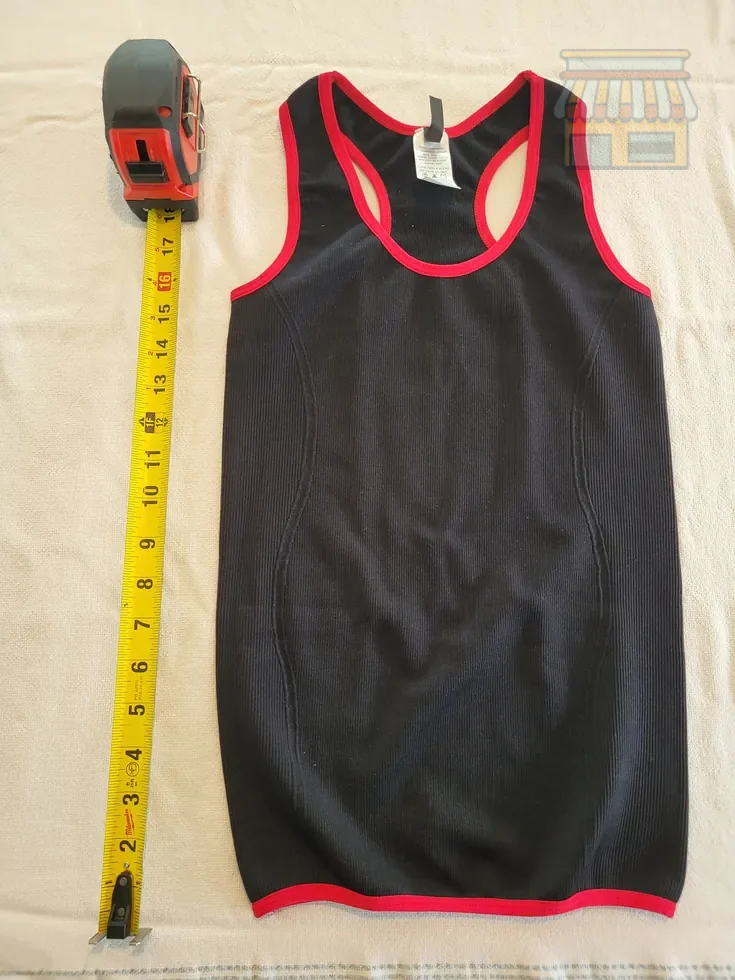 Girls' Black Racerback Tank Top with Red Trim • Condition: Excellent • Location: Davie, FL • Price: Free