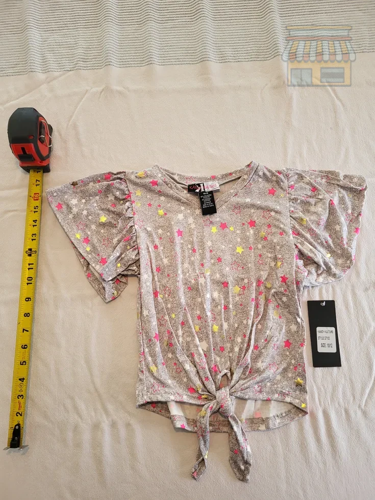 Girls' Star Pattern Tie-Front Top • Condition: Excellent • Location: Davie, FL • Price: Free