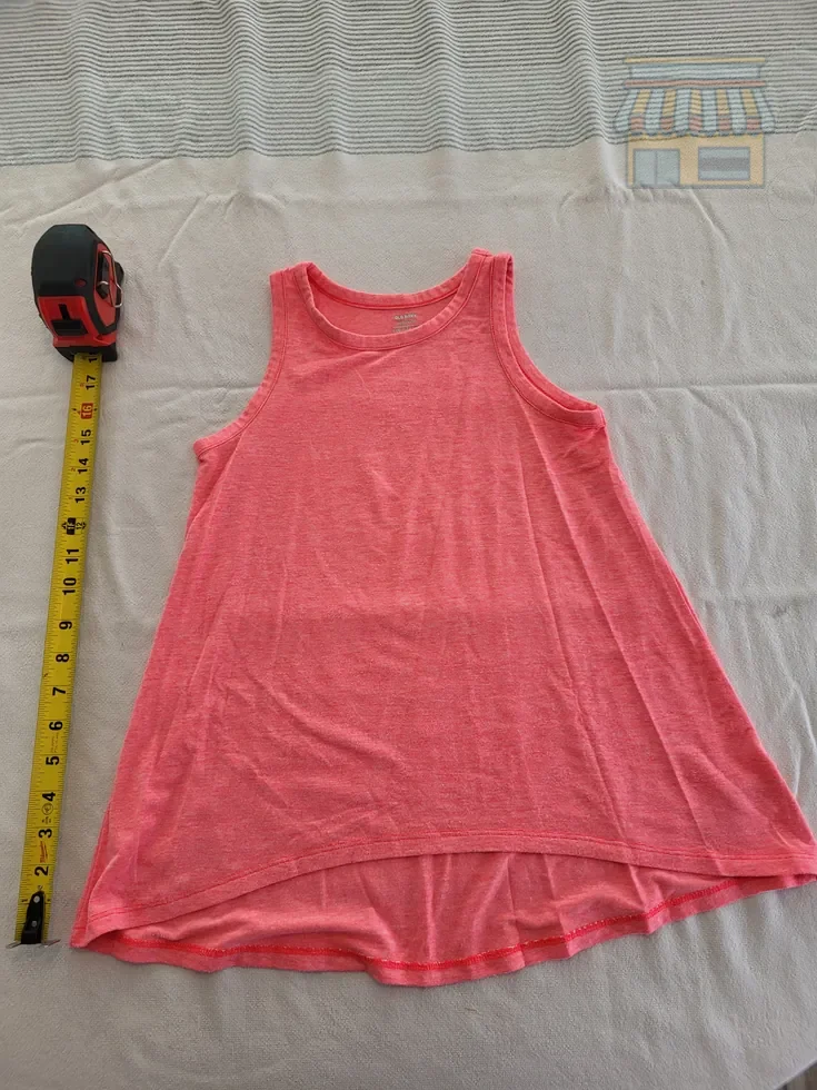 Girls' Coral Sleeveless Tank Top • Condition: Excellent • Location: Davie, FL • Price: Free