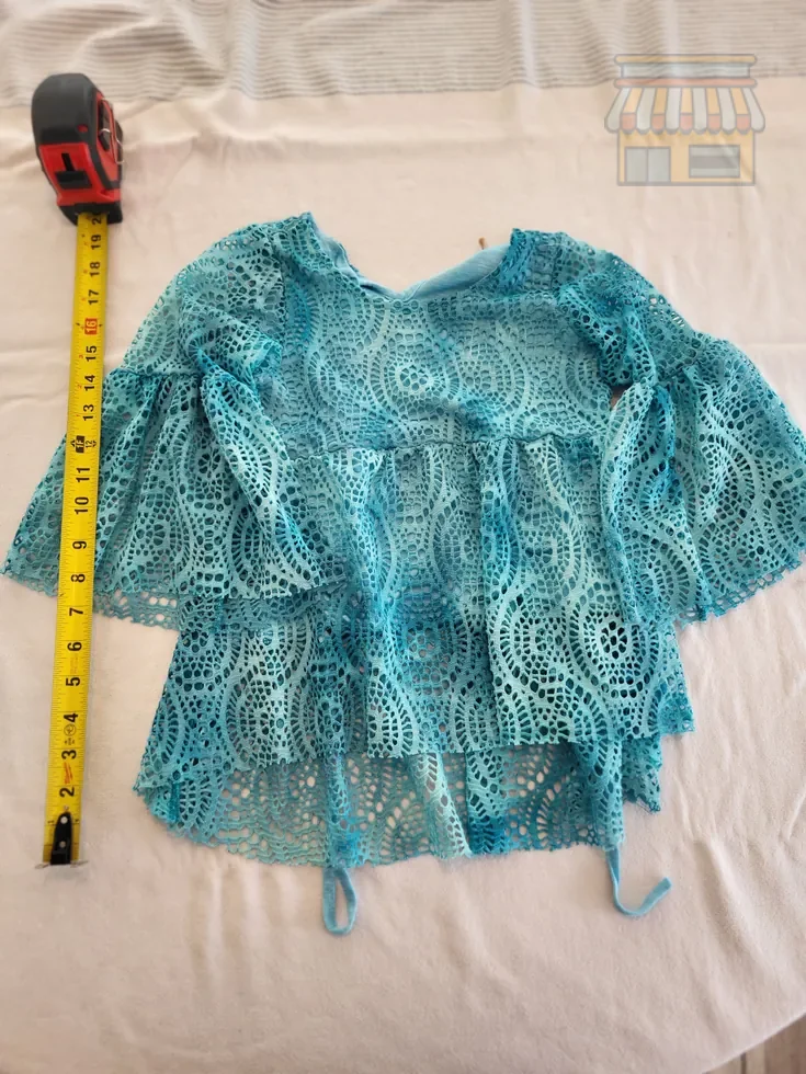 Turquoise Lace Girls' Top • Condition: Excellent • Location: Davie, FL • Price: Free