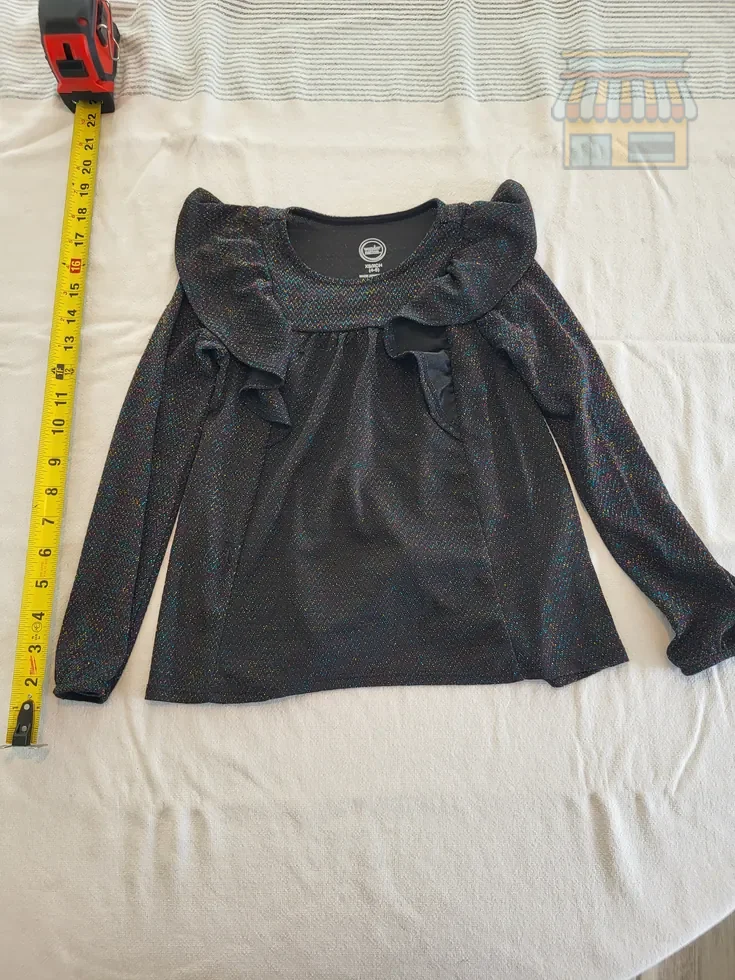 Girls' Black Long Sleeve Glitter Top • Location: Davie, FL • Price: Free